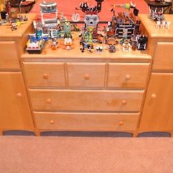 Dresser / desk/ Changing Table furniture 3 large drawers, 2 small size drawer with a 2 shelve cubby door. OBO