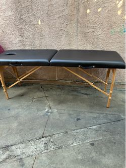 Massage table