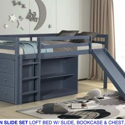 Twin loft  bed with slide, bookcase & chest. Available in grey & white. Assembly required.  Assembly not included.  Tax included.  Free local delivery
