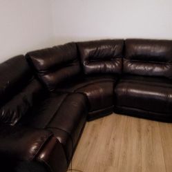 Leather sectional with recliner.