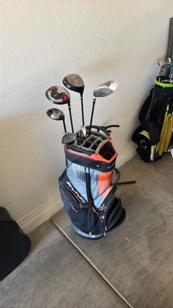 Golf Bag with a couple clubs