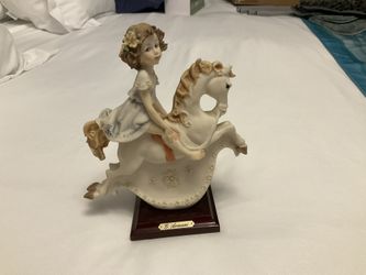 Armani Giuseppe Figurine