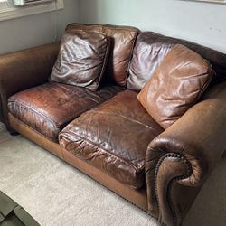 Brown Leather Couch With Reversible Pillows