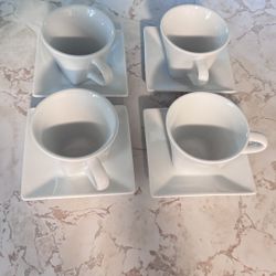 "Elegant 4-piece white ceramic cup and saucer set 