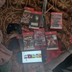 Nintendo switch 2 with games and headset,controllers. And case