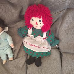 Raggedy Ann Doll And Porcelain Boy Doll 