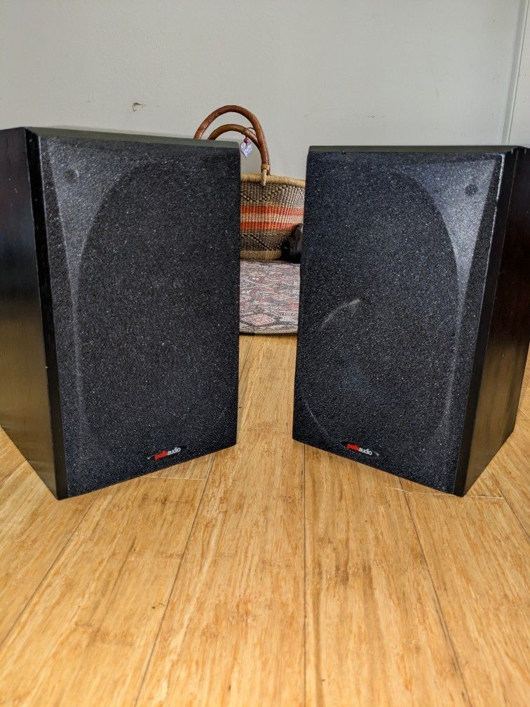 Two polk audio speakers
