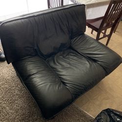 black leather sofa chair
