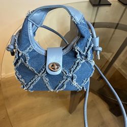 Blue ruffled bag