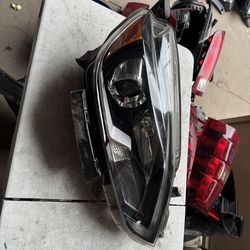 Nissan Sentra right headlight lid Oem
