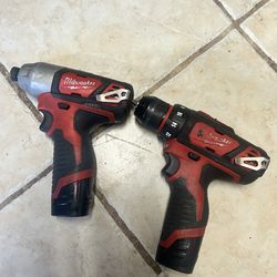 Milwaukee M-12 Impact drill set   With 2 Batteries