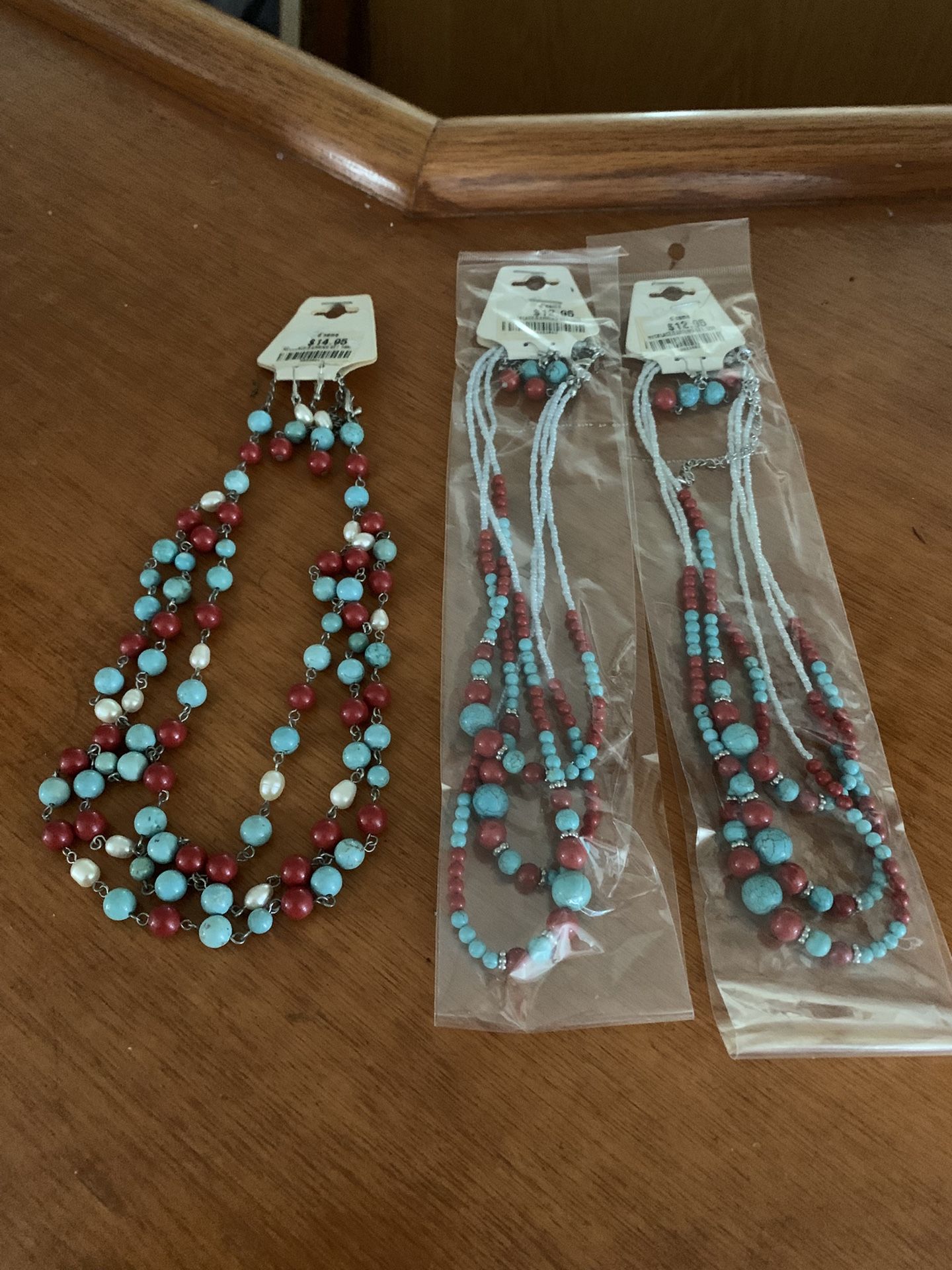 NEW TURQUOISE NECKLACE WITH EARRINGS. 8”L THE FIRST AND 9”L THE 2 ON THE RIGHT SIDE.