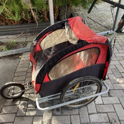 Jogger/bike attachment besides being a little dusty and dirty sitting in our garage works perfect