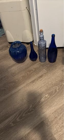 4 blue bottles