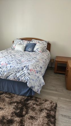 Queen size bed with tables