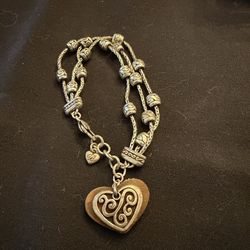Women’s sterling silver brighten bracelets with a dangling heart