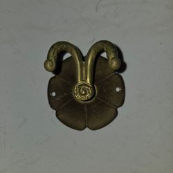 Vintage solid brass double wall hook, flower-shaped base, 3" diameter. Antique style hardware, gre