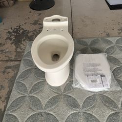 Toilet And Seat New