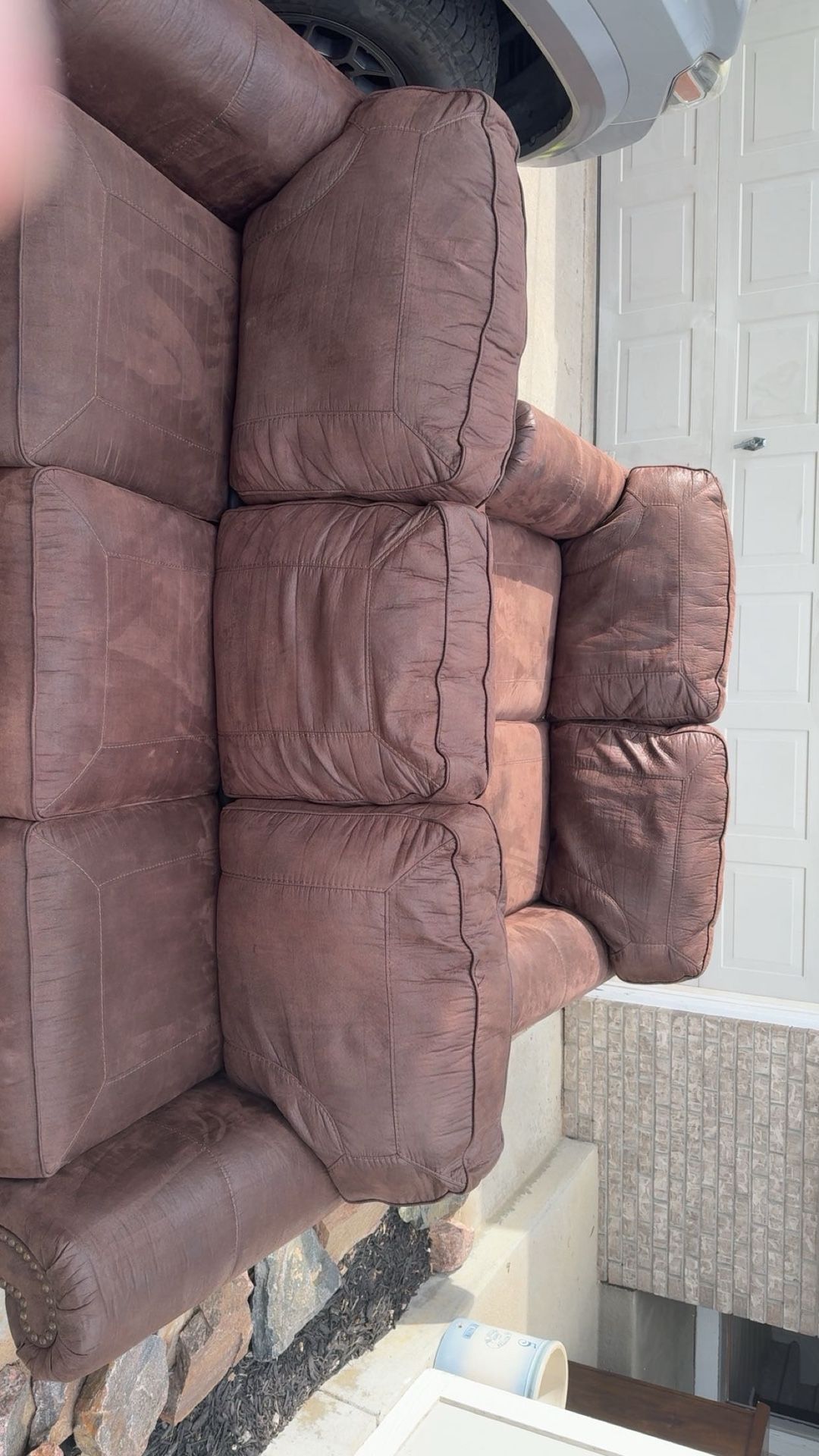 Brown Couch And Fireplace