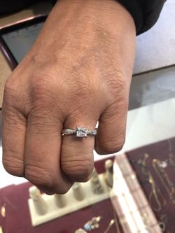 14 kt white gold , princess cut diamond solitaire