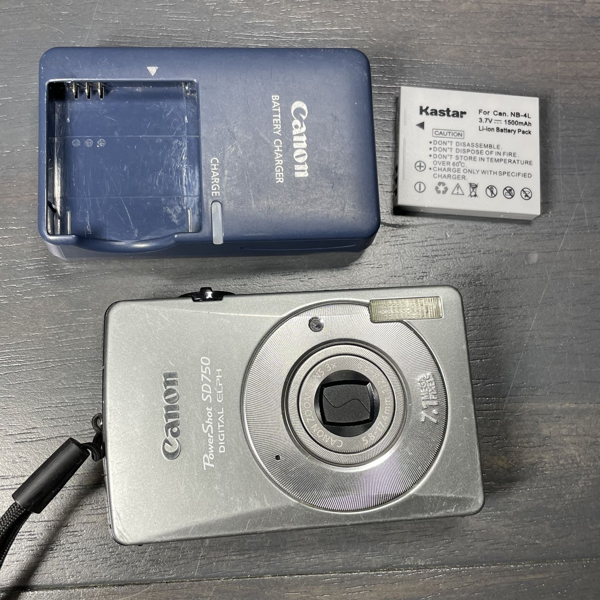 Canon PowerShot Digital ELPH SD750 Digital IXUS 75 7.1MP With Charger & Battery!  Check out my other cool listings!!!  (: I might have other items lik