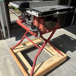 Skil table saw with roller stand