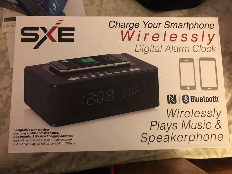 Wireless Phone Charger, clock, Bluetooth speaker all in one