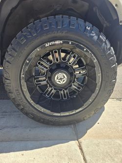 Anthem Off-Road Wheel with Mud Grip Tire 325/50R20LT