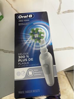 Brand New, Pro 1000 rechargeable toothbrush