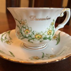 Find China teacup and saucer, floral pattern, trim, and gold by Ashton Drake grateful December