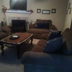 Sofa , Love Seat , And Chair With Ottoman And Pillows 