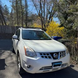2013 Nissan Rogue · SV w/SL Pkg Sport Utility 4D