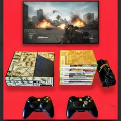 Microsoft Xbox 360 E with 2 controllers 10 games power supply