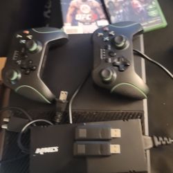 Xbox One X 1tb 2 Wireless Controllers And Two Games