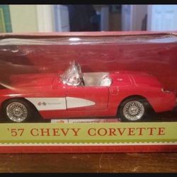 57 Chevy Corvette, 2002 New Diecast 1:24 scale, doors and hood open. Box has slight shelfware price firm.