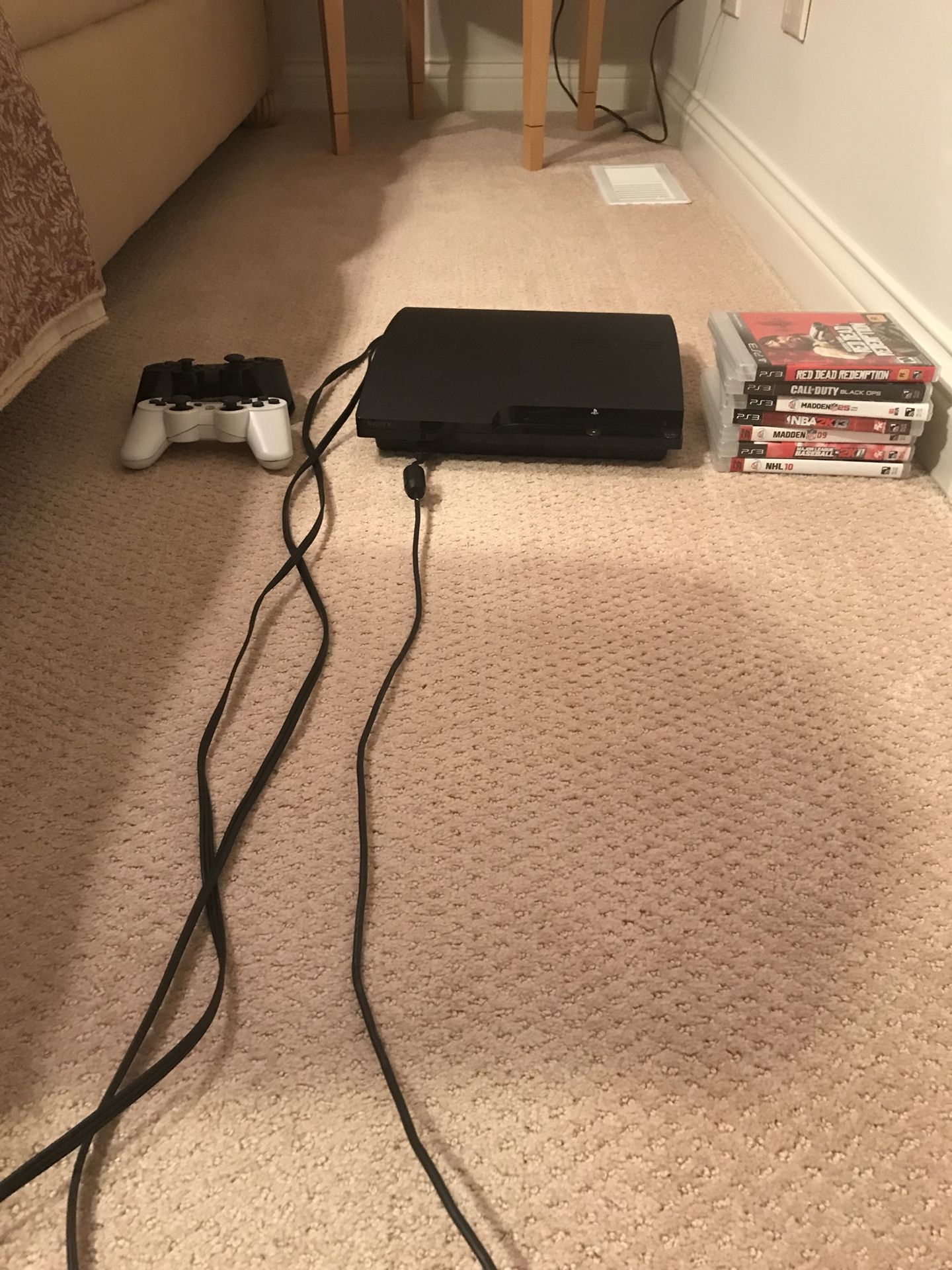 PlayStation 3 barely used with 7 games including: Red Dead Redemption, Call of Duty Black Opps, Grand Theft Auto IV, DJ Hero 2, MLB 2k11, NHL 10, Mad