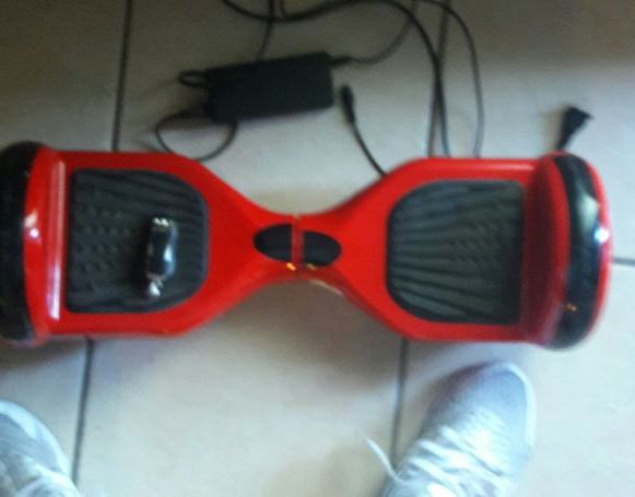 Hoverboard with Bluetooth speaker and led light on top of the hoverboard and in front