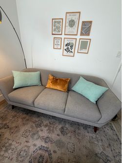 Matching living spaces mid century couches