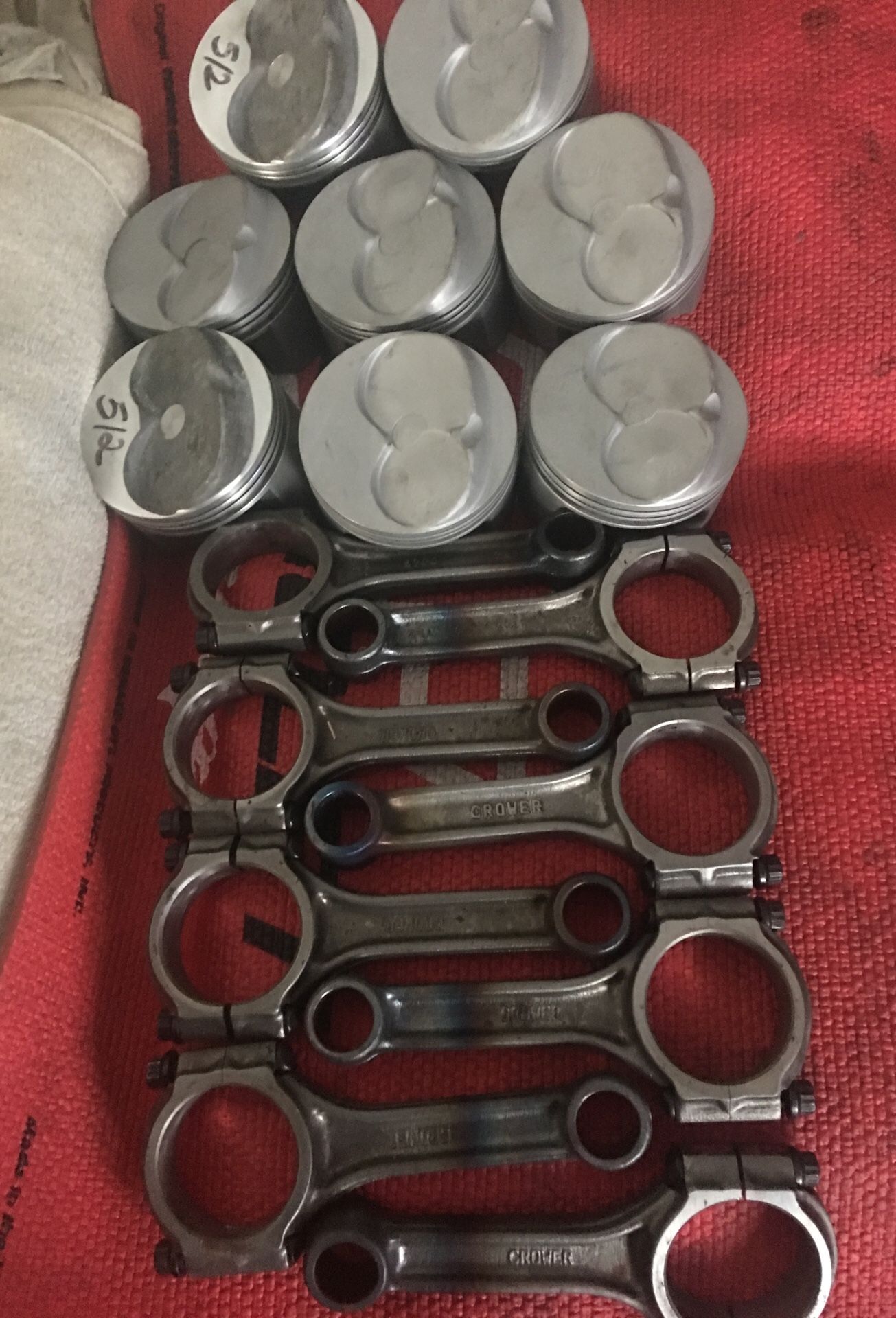 A set of Manley pistons used in good condition a set of CROWER RODS recondition with new ARP ROD bolts for small block Chevy $175.00