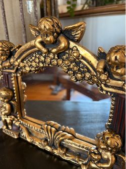 Beautiful vintage wall, angels mirror