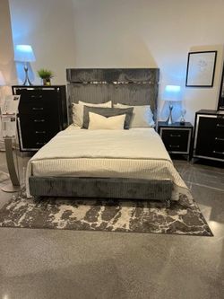 Luxurious bedroom set features Stylish wingback bed w/ gold/Silver finish trim