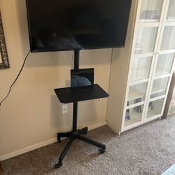 40” TCL ROKU Television On Stand w/ High Definition Antenna For Local Channels