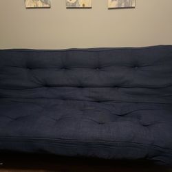 Blue Futon Daybed with Storage Pockets – Converts to Bed