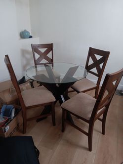 Living room set, dining room table with 4 chairs. 45"  Sony TV 2 drawer console,  side table, lamp , rugs.