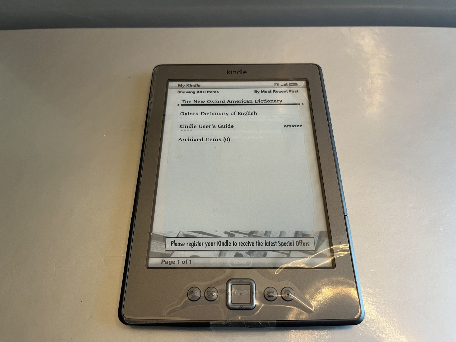 Amazon Kindle 4th Gen Model D01100 Wi-Fi 6 inch Screen & Charger - $25