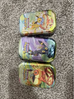 Prismatic tins