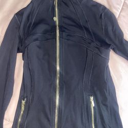 Black with gold zippers Lululemon