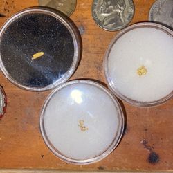 Three small golden nuggets one of them very rare