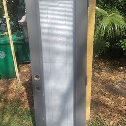 Exterior metal door with inner blinds none impact bottom corner minor repair has been done see photos 24 x 79