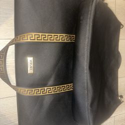 Two pcs Versace fragrance bag Black and gold like new